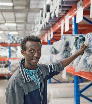 Jemal Shiferan is responsible for a large warehouse full of textiles, yarns and buttons. The young engineer says much of what he learned during his GIZ training is proving invaluable in his work in the factory.