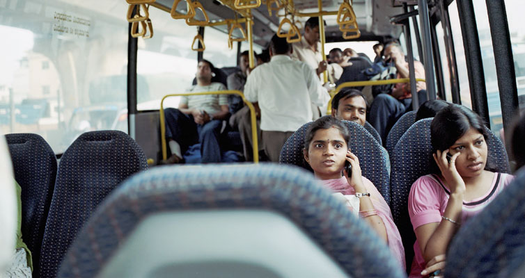 On the road: better transport links in many countries enable people to commute to work, sometimes over long distances.(Photo: Laif/Julia Knop)