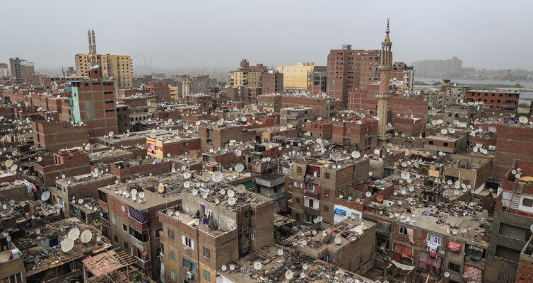 View of Ezbet al-Nasr: The houses are built close together, but with a lot of room for gardening on the roofs.