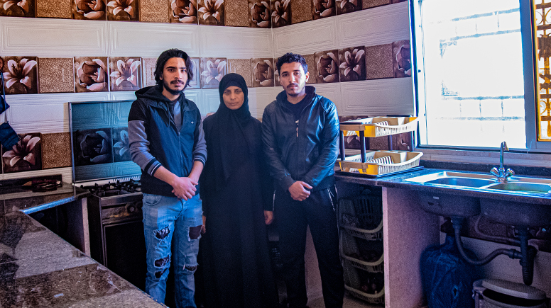 Sarah Qasim Hilal with her sons